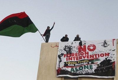 Libyan demonstrators flying the Kingdom of Libya flag, in the main square of Benghazi on 28 February 2011.