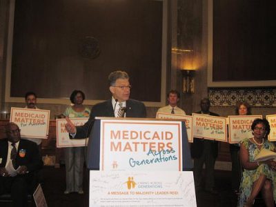 Sen. Franken speaks out in support of Caring Across Generations. Photo by Jobs with Justice. 