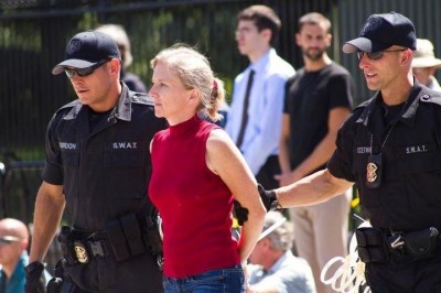 Daphne Wysham gets arrested at the White House while protesting the Keystone XL pipeline. Photo by Shadia Fayne Wood