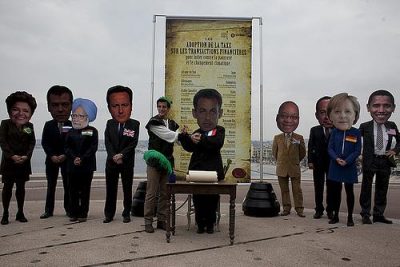 At an action this week, Robin Hood visited G-20 leaders. Photo and action by Oxfam International.