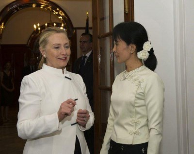 Hillary Clinton talking with Aung San Suu Kyi.