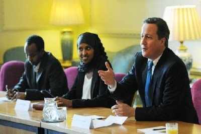 British Prime Minister David Cameron (R) takes part in a round table discussion at 10 Downing Street in London, as he meets members of the London Somali community. Picture courtesy of Reuters.