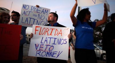 Anti-Romney protesters in Florida (Charles Dharapak / AP)