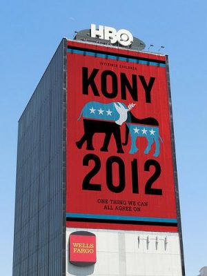 A Kony 2012 billboard is displayed above a Wells Fargo advertisement at the HBO headquarters. Photo by Avakian/Flickr.