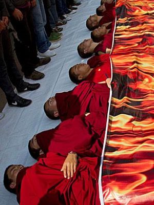 Tibetan monks represent self-immolations