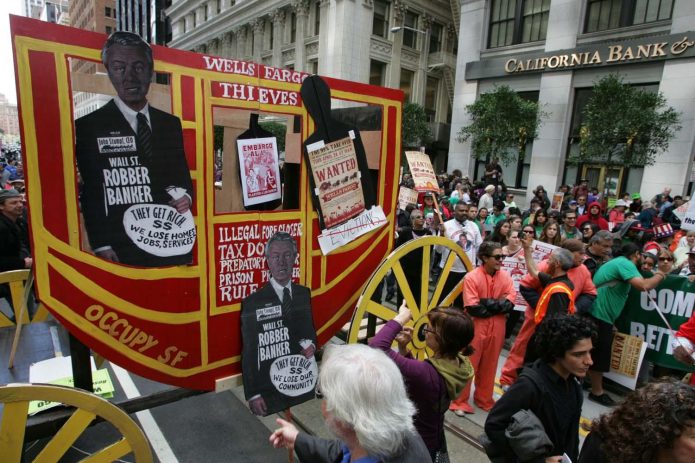 Protesters brought a makeshift wagon to the Wells Fargo protest. Photo by Mike Koozmin (SF Examiner)