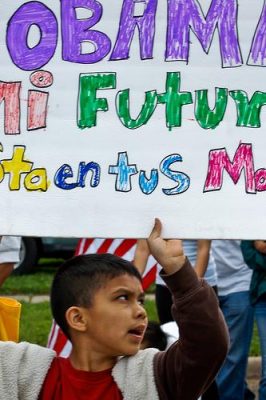 A young protester holds up a sign urging Obama to change the dreamers&#039; future. Photo by Sasha Yimel/Flickr.