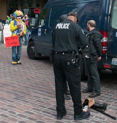 Police arrest a photographer during a May Day protest in Seattle. (Michael Holden / Flickr)