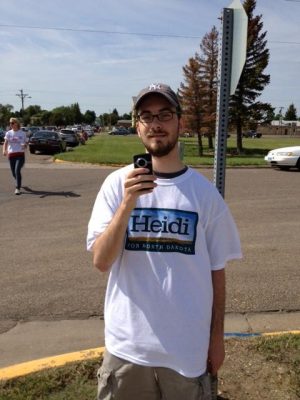A conservative tracker wears a campaign t-shirt of a North Dakota Democratic candidate for U.S. Senate. Photo credit: NorthDecoder.com