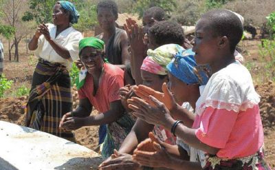 Women of Njolo, Malawi, celebrate a new irrigation project to help them adapt to climate change. Photo credit: CIDSE - Catholic Development Agencies.
