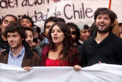 Student leaders Noam Titelman, Camila Vallejo and Boris Gabriel participate in a demonstration in downtown Santiago
