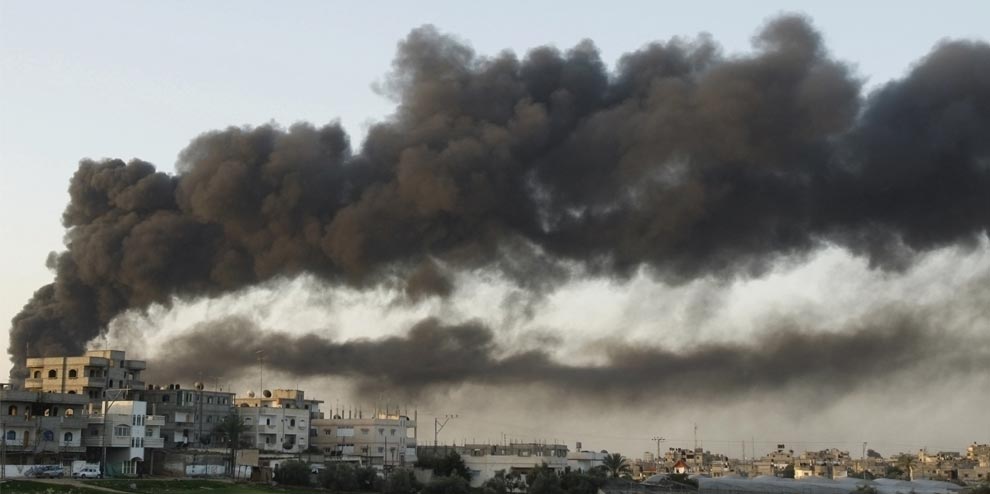 Israel Gaza burning buildings