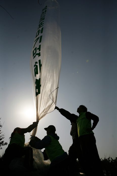 Korean activists launch balloons containing leaflets speaking out against the North Korean regime.  