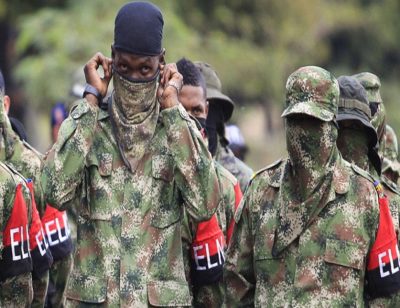 colombia-eln-militant-in-uniform