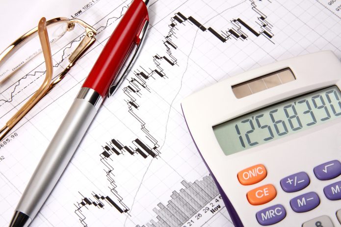 finances-charts-red-pen-calculator