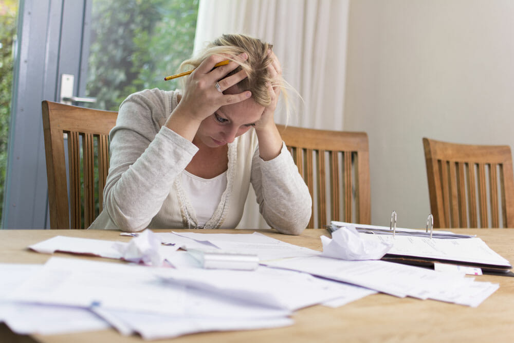 woman-stressed-bills-economy