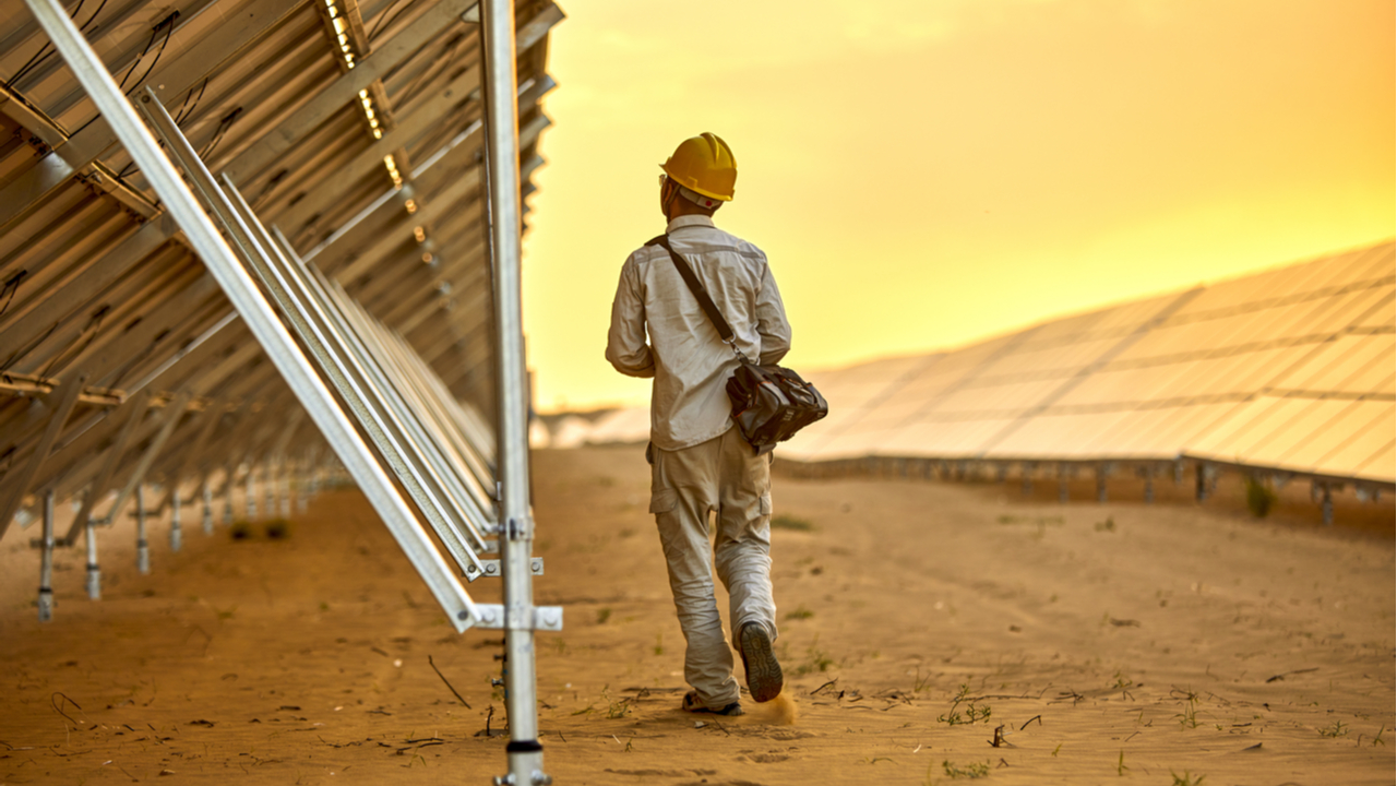 worker at a solar power plant