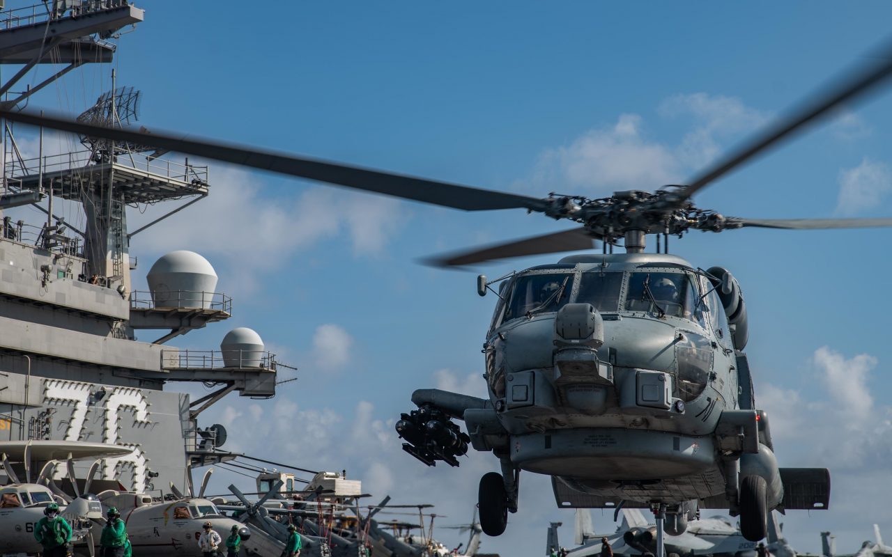 Military Budget - United States Navy Helicpoter launches from USS Ronald Reagan