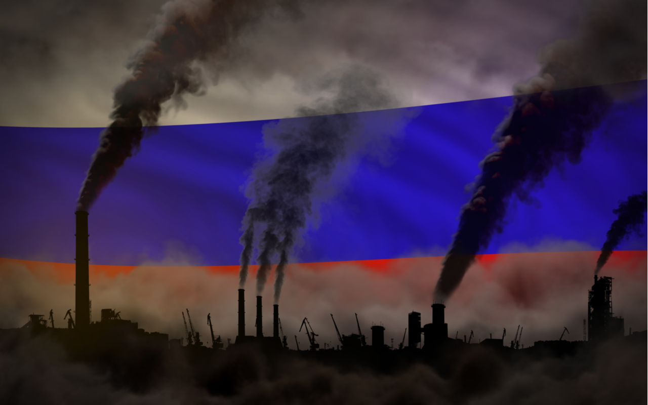 coal plants and emissions with a russian flag as the background
