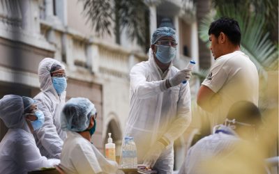 Medics arrive to take blood samples of residents of Spanish Garden residential complex after a COVID-19 positive case was detected in an apartment, in Guwahati.