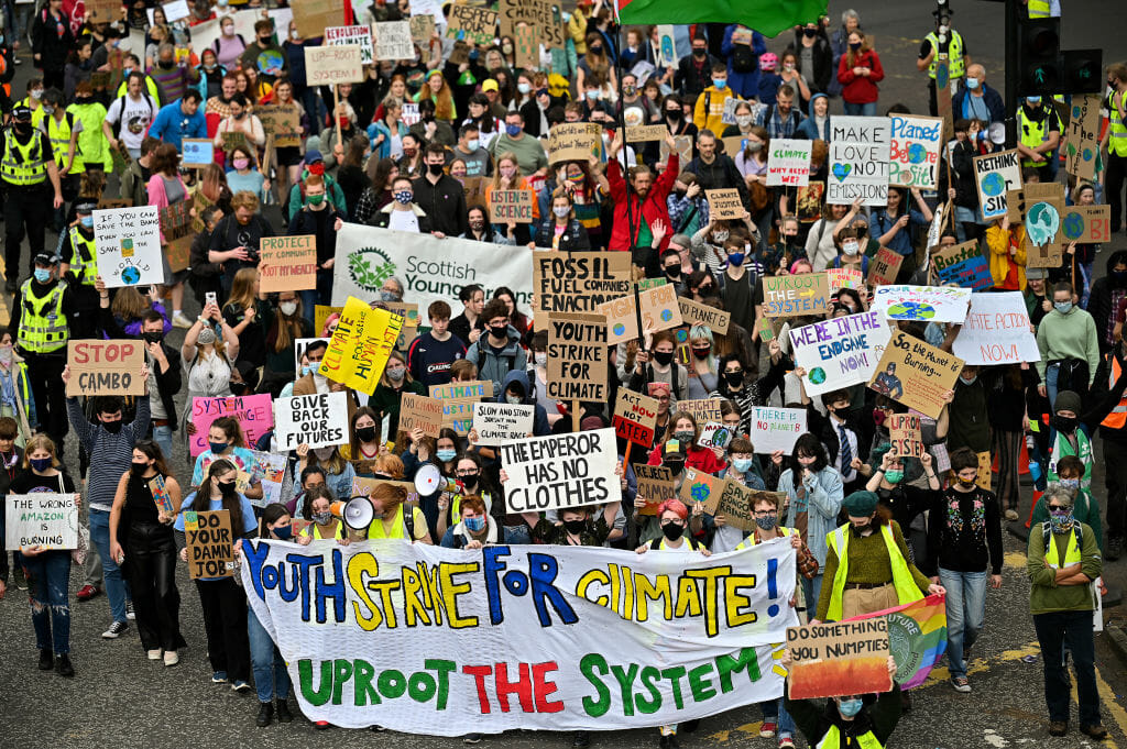 rows of protesters at a youth climate strike