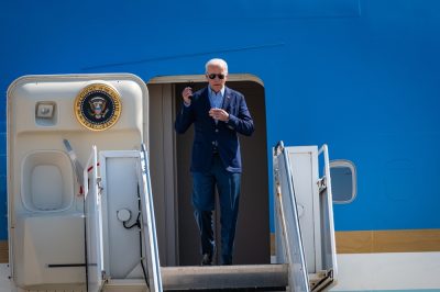president joe biden exiting a plane