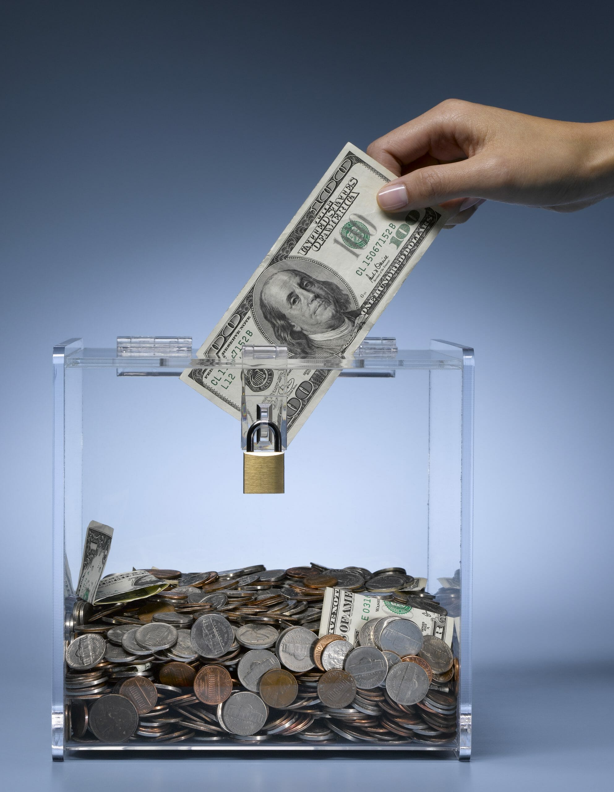 money going into a savings jar
