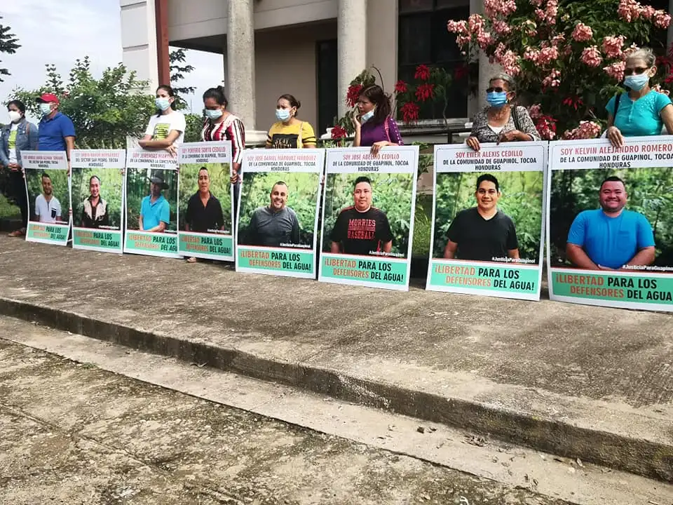 One of the many protests in Honduras during the pandemic by the Comité Municipal en Defensa de los Bienes Comunes y Públicos, calling for the release of eight water defenders standing up for the Guapinol and San Pedro rivers. (Photo: Guapinol Resiste)