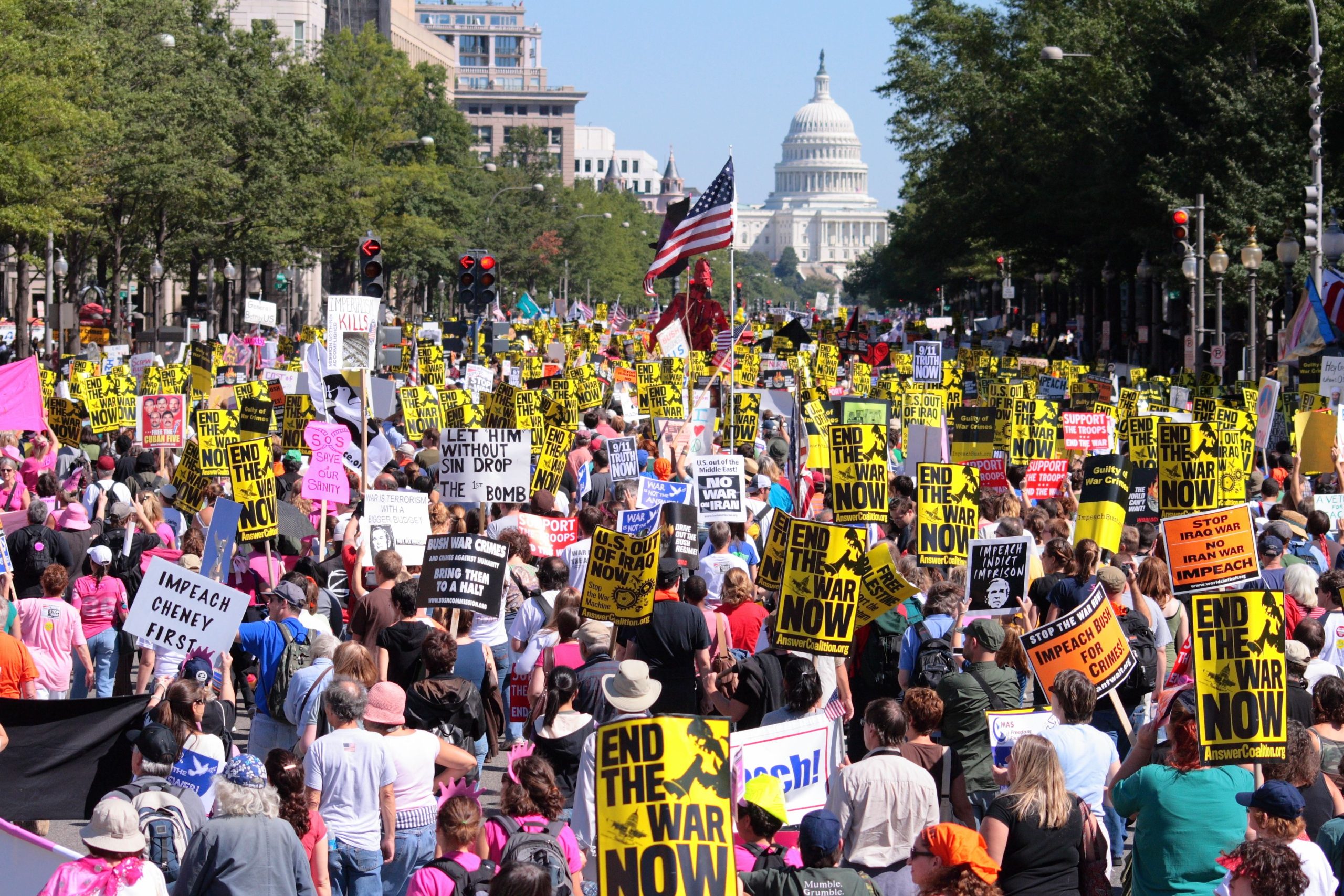 A mass of anti-war protestors march down Pennsylvania Ave. toward the Capitol Building in Washington, DC on September 15, 2007, demonstrating against the Iraq War.